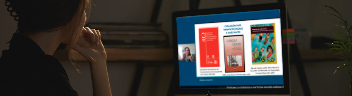 Woman watching a webinar on a computer.
