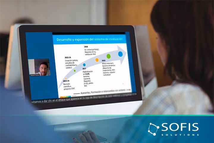 Woman watching a webinar on a computer.