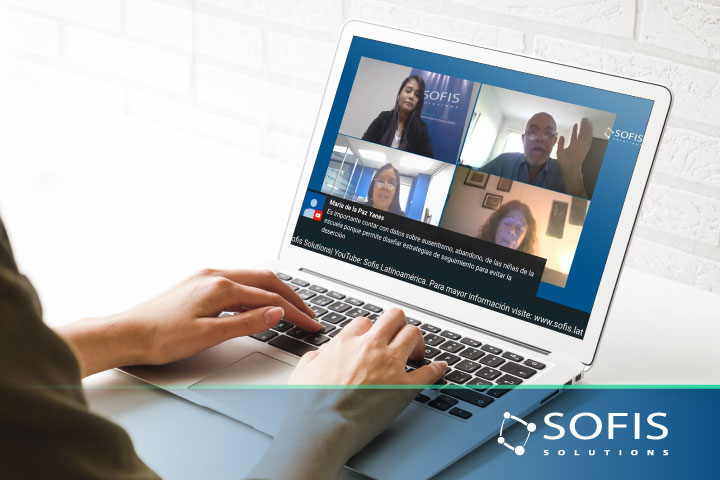 Person watching a webinar on a laptop